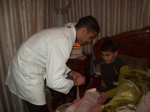 Firas with volunteer nurse Mohammed