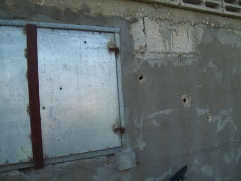 Behind these bullet holes is the kitchen, Dec/Jan attacks